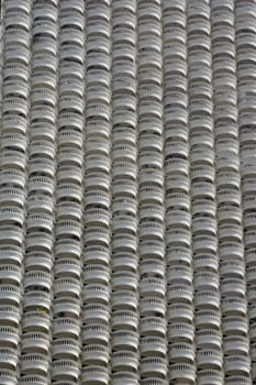 A skyscraper with many balconies on the Mae Nam Chao Phraya River in the capital Bangkok of Thailand in South East Asia.
