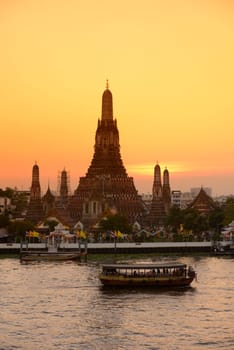 The temple complex of Wat Arun on the Mae Nam Chao Phraya River in the capital Bangkok of Thailand in South East Asia.