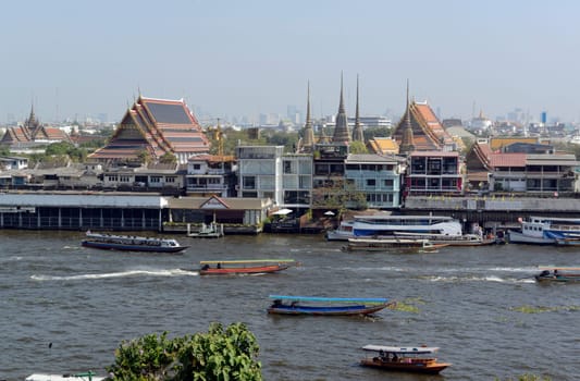 The temple complex of Wat Arun on the Mae Nam Chao Phraya River in the capital Bangkok of Thailand in South East Asia.