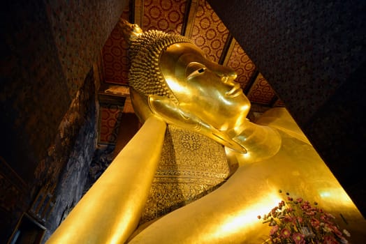 The Reclining Buddha in the temple complex of Wat Pho in the capital Bangkok of Thailand in South East Asia.