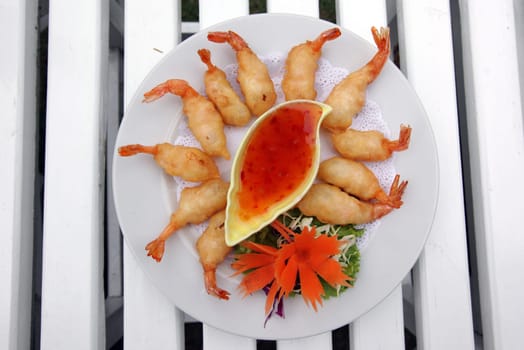 Seafood and cuvette sing in a restaurant at Khao Sam Roi Yot National Park on the Gulf of Thailand in the south western of Thailand in South East Asia.