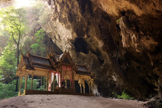 The Hoehle Tham Phraya Nakhon with the Royal Hall of Rama V from 1890 in the rocky landscape of khao Sam Roi Yot National Park on the Gulf of Thailand in the south western of Thailand in South East Asia.