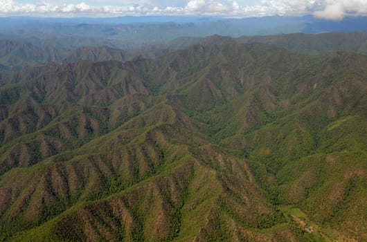 View from a plane on the flight from Chiang Mai to the village of Mae Hong Son in northern Thailand in South East Asia.