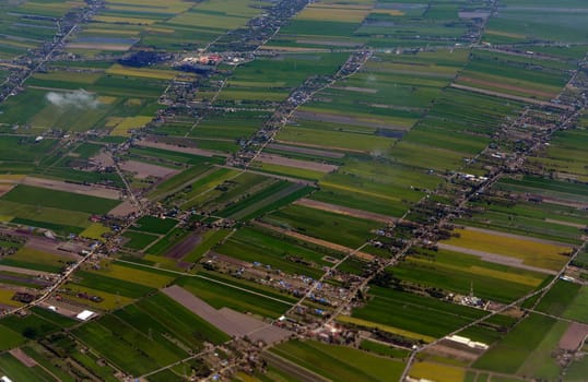 View from a plane on the flight over Chiang Mai in the north of Thailand in South East Asia.