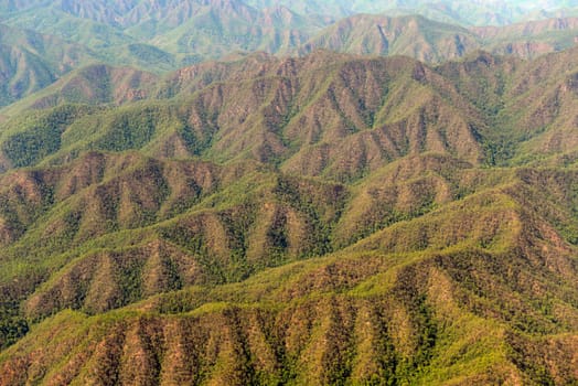 View from a plane on the flight from Chiang Mai to the village of Mae Hong Son in northern Thailand in South East Asia.