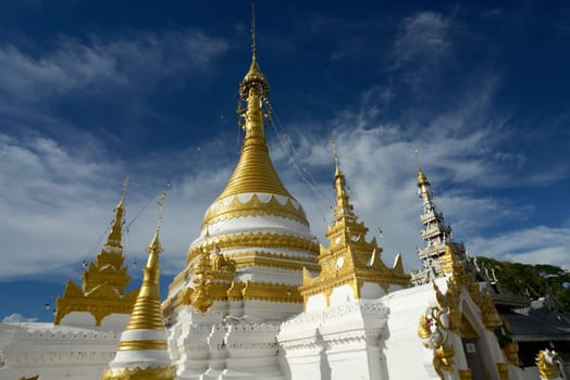 The Wat Jong Kham and Jong Klang temple on Lake Nong Jong Kham in the village of Mae Hong Son in northern Thailand in South East Asia.