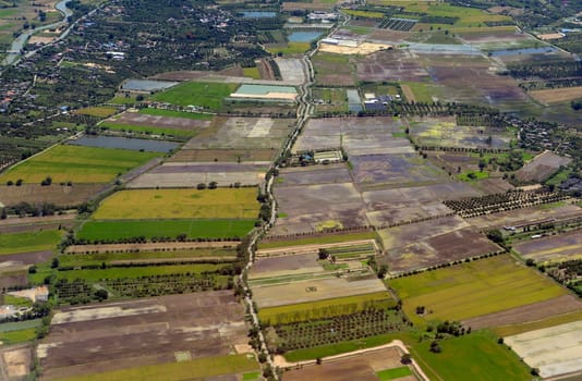 View from a plane on the flight over Chiang Mai in the north of Thailand in South East Asia.