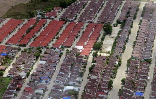 View from a plane on the flight over Chiang Mai in the north of Thailand in South East Asia.