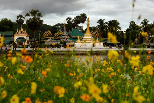 The Wat Jong Kham and Jong Klang temple on Lake Nong Jong Kham in the village of Mae Hong Son in northern Thailand in South East Asia.