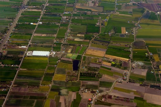 View from a plane on the flight over Chiang Mai in the north of Thailand in South East Asia.