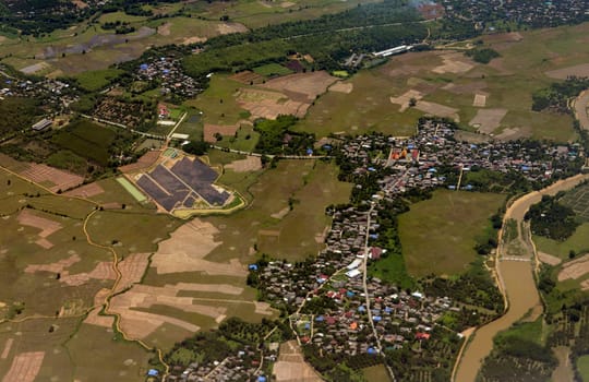 View from a plane on the flight over Chiang Mai in the north of Thailand in South East Asia.