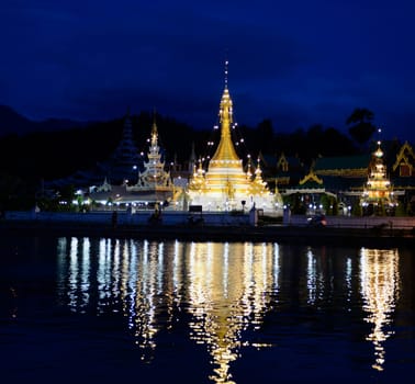 The Wat Jong Kham and Jong Klang temple on Lake Nong Jong Kham in the village of Mae Hong Son in northern Thailand in South East Asia.