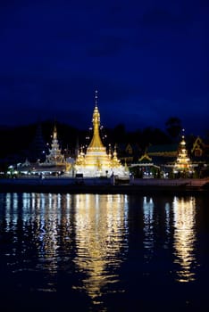 The Wat Jong Kham and Jong Klang temple on Lake Nong Jong Kham in the village of Mae Hong Son in northern Thailand in South East Asia.