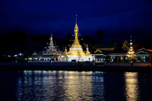 The Wat Jong Kham and Jong Klang temple on Lake Nong Jong Kham in the village of Mae Hong Son in northern Thailand in South East Asia.