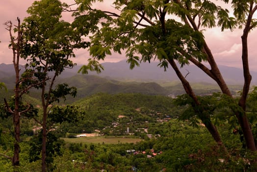Die Landschaft mit der Bergstrasse zwischen Mae Hong on und pai in der Bergregion von Mae Hong Son im norden von Thailand in Suedostasien.