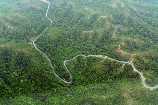 The landscape with the mountain road between Mae Hong on and pai in the mountain oust of Mae Hong Son in the north of Thailand in South East Asia.