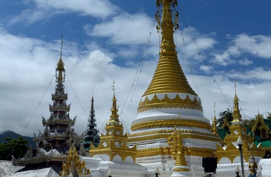 The Wat Jong Kham and Jong Klang temple on Lake Nong Jong Kham in the village of Mae Hong Son in northern Thailand in South East Asia.