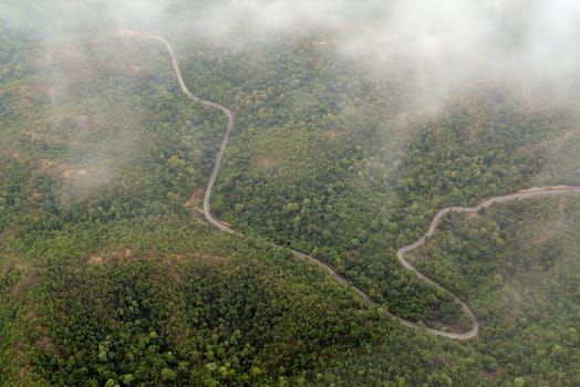 The landscape with the mountain road between Mae Hong on and pai in the mountain oust of Mae Hong Son in the north of Thailand in South East Asia.