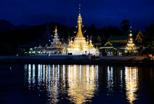 The Wat Jong Kham and Jong Klang temple on Lake Nong Jong Kham in the village of Mae Hong Son in northern Thailand in South East Asia.