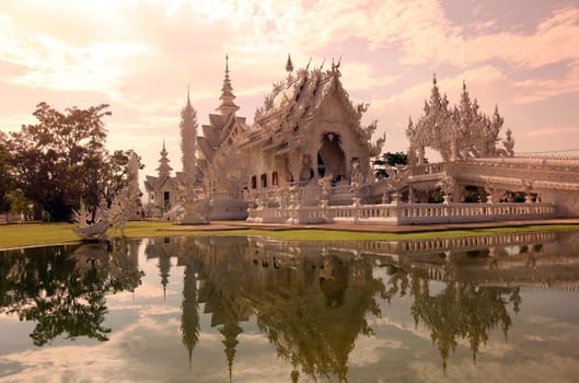The temple Wat Rong Khun 12 km south of Chiang Rai in the province of chiang Rai in the north of Thailand in South East Asia.