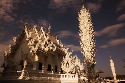 The temple Wat Rong Khun 12 km south of Chiang Rai in the province of chiang Rai in the north of Thailand in South East Asia.