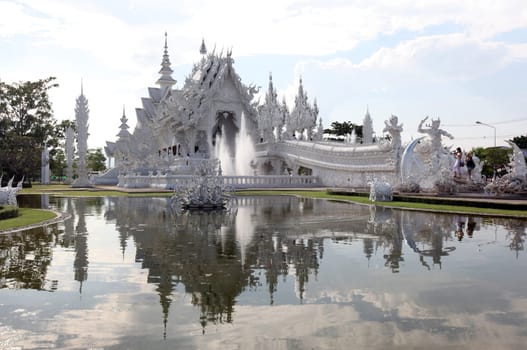 The temple Wat Rong Khun 12 km south of Chiang Rai in the province of chiang Rai in the north of Thailand in South East Asia.