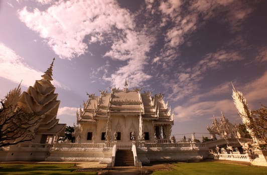 The temple Wat Rong Khun 12 km south of Chiang Rai in the province of chiang Rai in the north of Thailand in South East Asia.