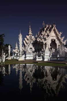 The temple Wat Rong Khun 12 km south of Chiang Rai in the province of chiang Rai in the north of Thailand in South East Asia.