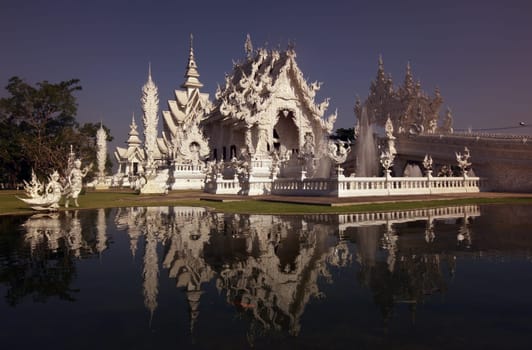 The temple Wat Rong Khun 12 km south of Chiang Rai in the province of chiang Rai in the north of Thailand in South East Asia.