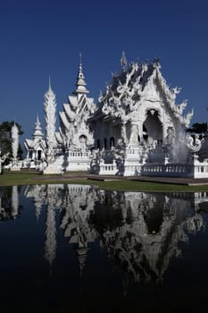 The temple Wat Rong Khun 12 km south of Chiang Rai in the province of chiang Rai in the north of Thailand in South East Asia.