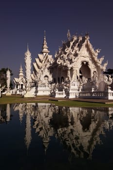 The temple Wat Rong Khun 12 km south of Chiang Rai in the province of chiang Rai in the north of Thailand in South East Asia.