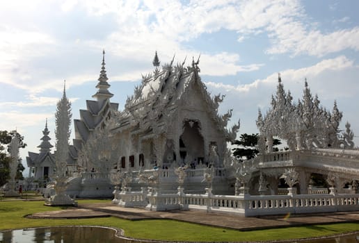 The temple Wat Rong Khun 12 km south of Chiang Rai in the province of chiang Rai in the north of Thailand in South East Asia.