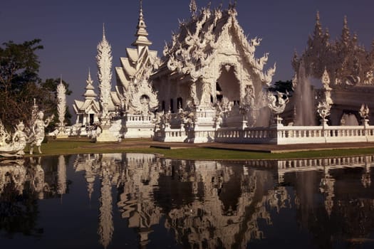 The temple Wat Rong Khun 12 km south of Chiang Rai in the province of chiang Rai in the north of Thailand in South East Asia.