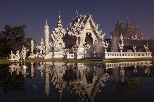 The temple Wat Rong Khun 12 km south of Chiang Rai in the province of chiang Rai in the north of Thailand in South East Asia.