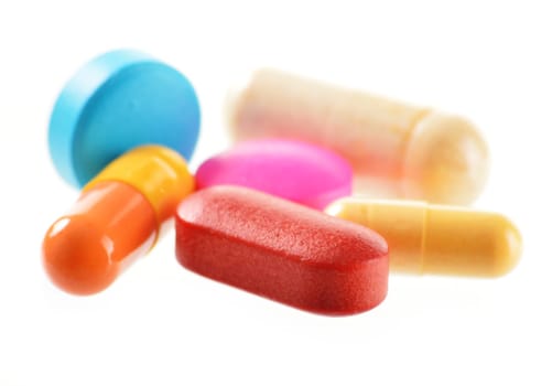 Composition with drug pills isolated on white background