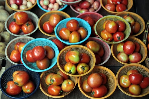 Tomatoes at the market of Nonthaburi in the north of Bangkok the capital of Thailand in South East Asia.