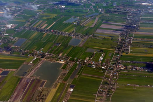 The landscape with agricultural operated east of the capital Bangkok of Thailand in South East Asia.