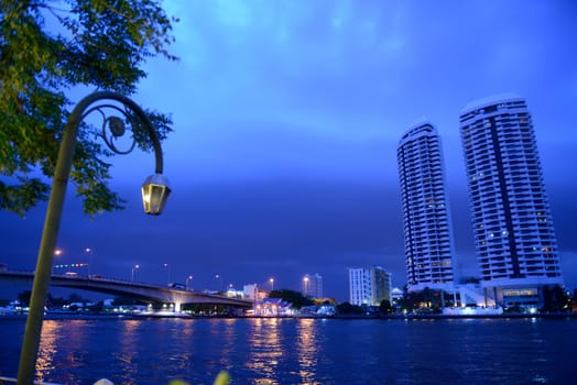 An apartment house at Mae Nam Chao Phraya in the capital Bangkok of Thailand in South East Asia.