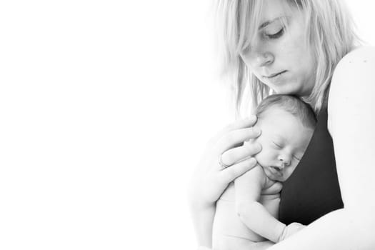 happy newborn baby girl just a week old photographed in the studio