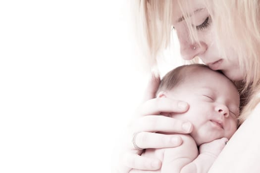 happy newborn baby girl just a week old photographed in the studio