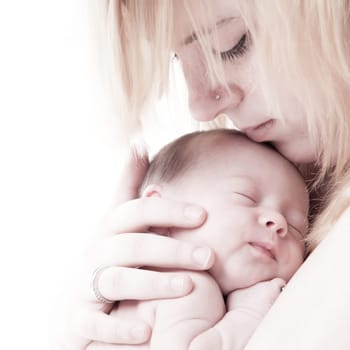 happy newborn baby girl just a week old photographed in the studio