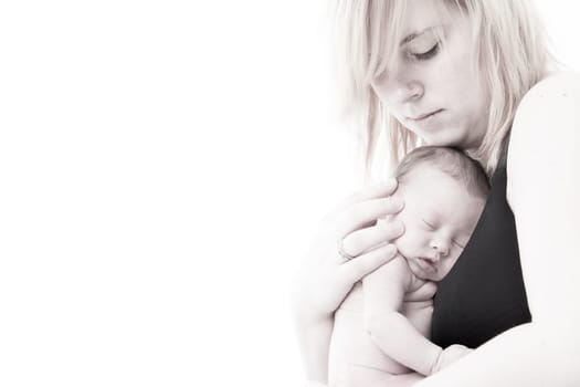 happy newborn baby girl just a week old photographed in the studio
