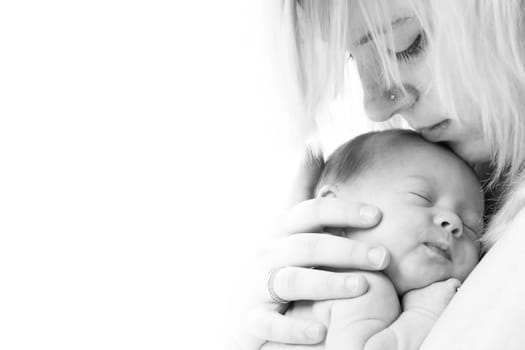 happy newborn baby girl just a week old photographed in the studio
