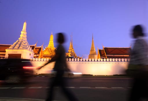 The temple gelaende in the evening atmosphere with Wat Phra Keo at the Royal Palace in the historical center of the capital Bangkok in Thailand.