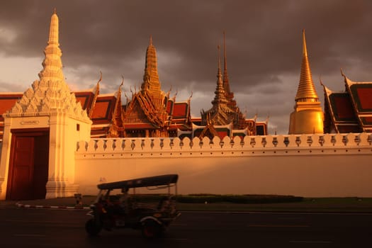The temple gelaende in the evening atmosphere with Wat Phra Keo at the Royal Palace in the historical center of the capital Bangkok in Thailand.