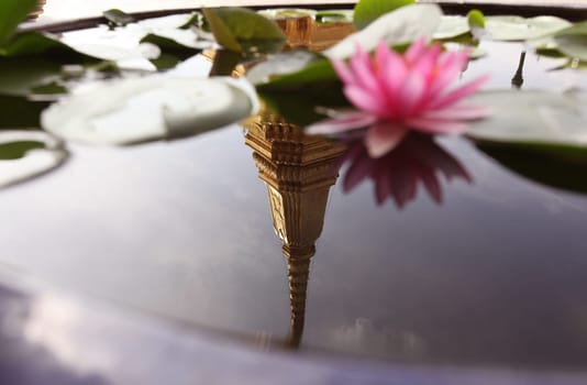 A lotus flower in Wat Phra Keo in the Temple Gelaende near the Royal Palace in the historic center of the capital Bangkok in Thailand.