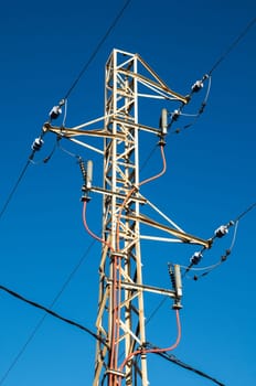 Energy Electricity Power Pylon on a Blue Sky