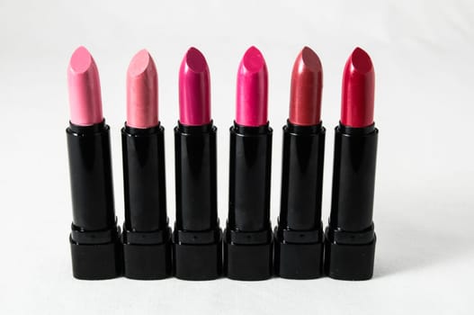 Lipstick in Black Container on a white background