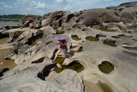 The stone landscape in the Mekong River of the Natural Park Sam Phan Bok near Lakhon Pheng on the Mekong River in the province of Amnat Charoen northwest of Ubon Ratchathani in northeastern Thailand in South East Asia.