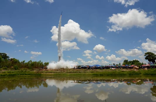 A racket starts at the traditional rocket festival or Bun Bang Fai or Rocket Festival in Ban Si Than in Amnat Charoen province northwest of Ubon Ratchathani in northeastern Thailand in South East Asia.
